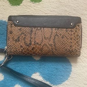 Leather wallet, 4” x 7.5” wide x 0.75” thick